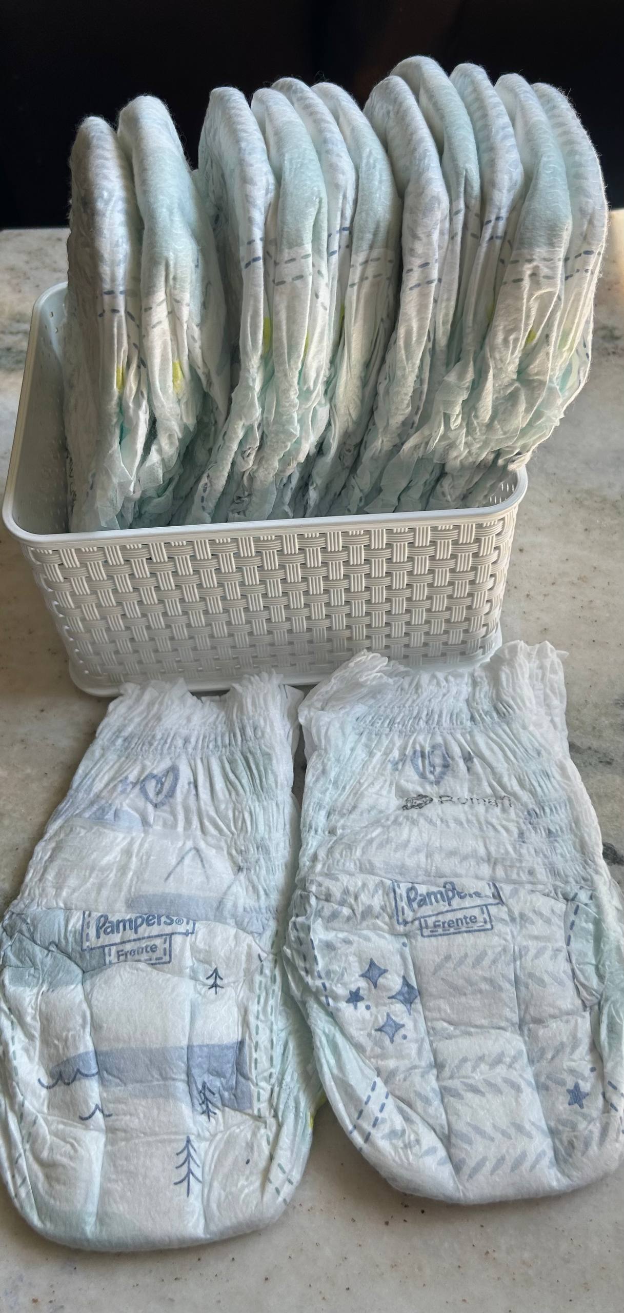 Остатки Pampers pants Premium care. 13 штук, из них на трех проштамповано имя сы