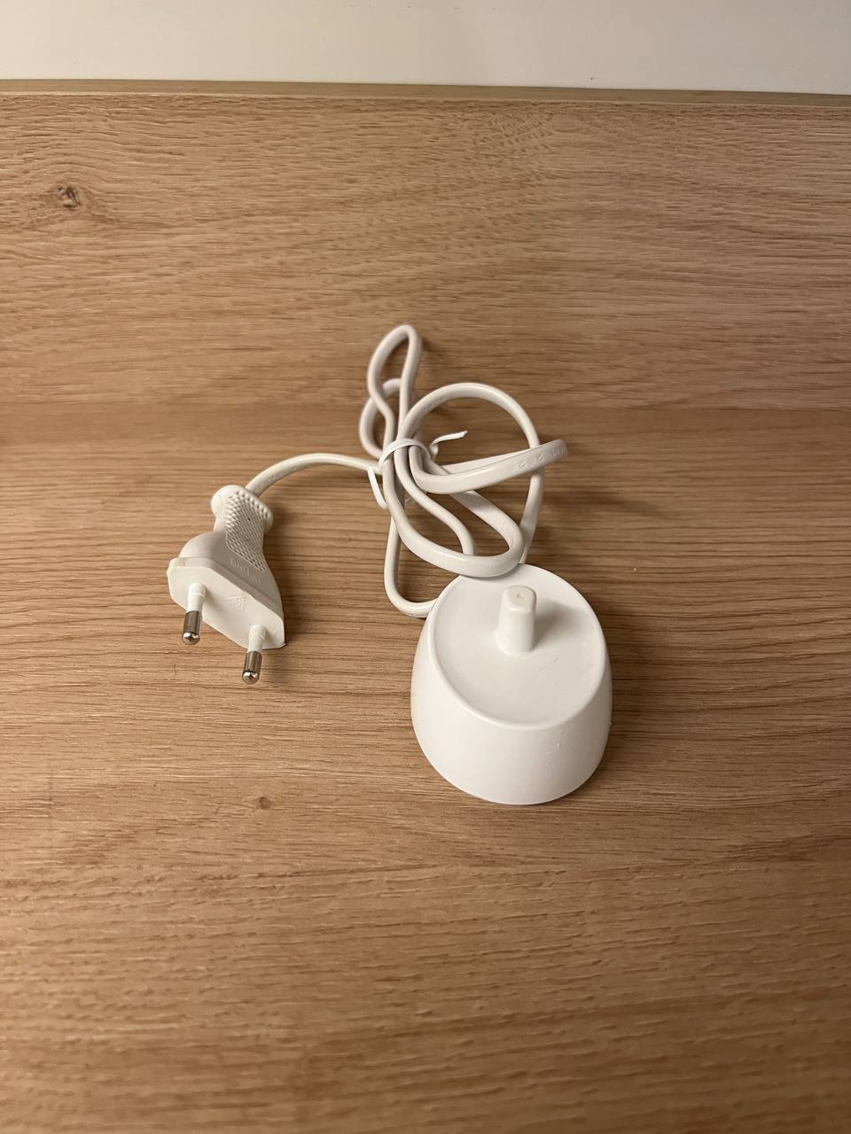 Зарядку для щетки Braun